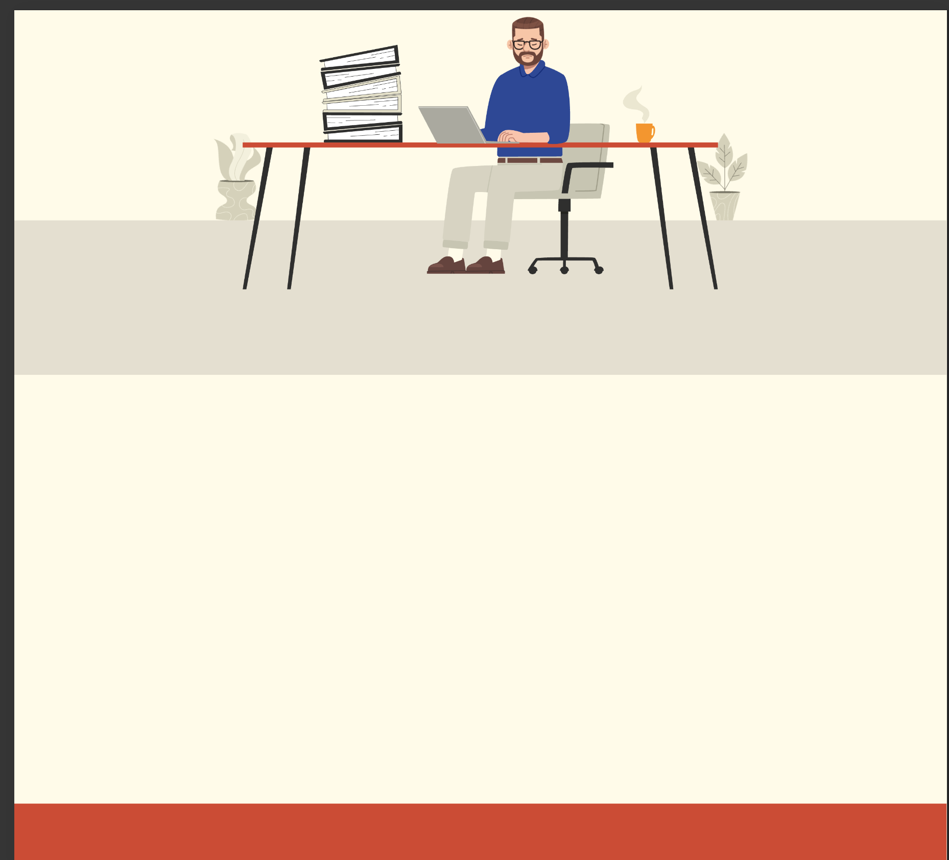 Man with beard working at desk on laptop